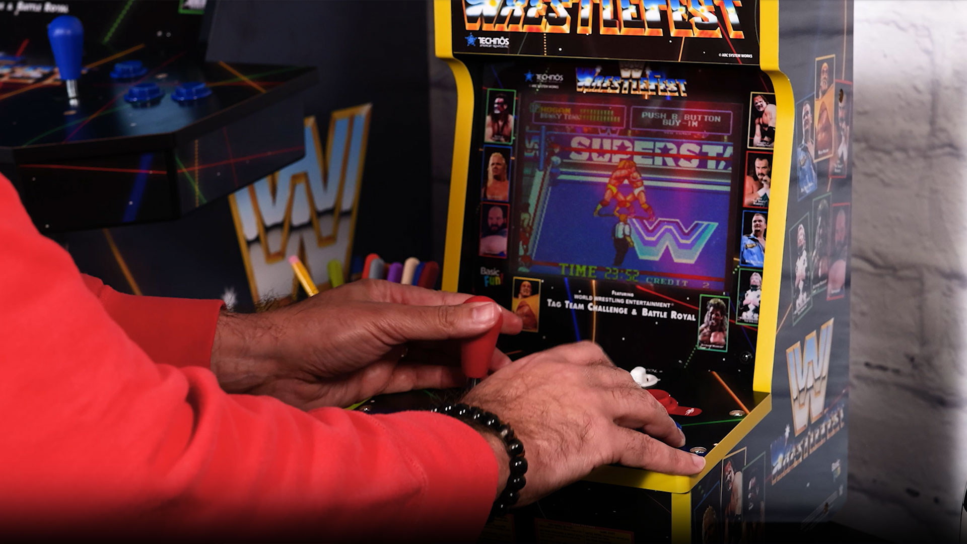 thumbnail video image 2 of Arcade Classics WWE Counter Series Game Machine with 8" Liquid Crystal Screen & 4 Games, 2 of 7